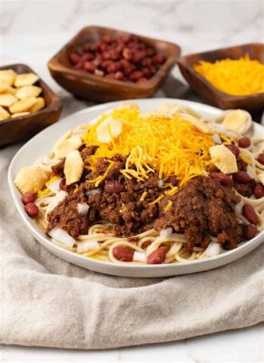   Cincinatti Chili -  A Savory Symphony of Spiced Ground Beef and Melted Cheddar Cheese!